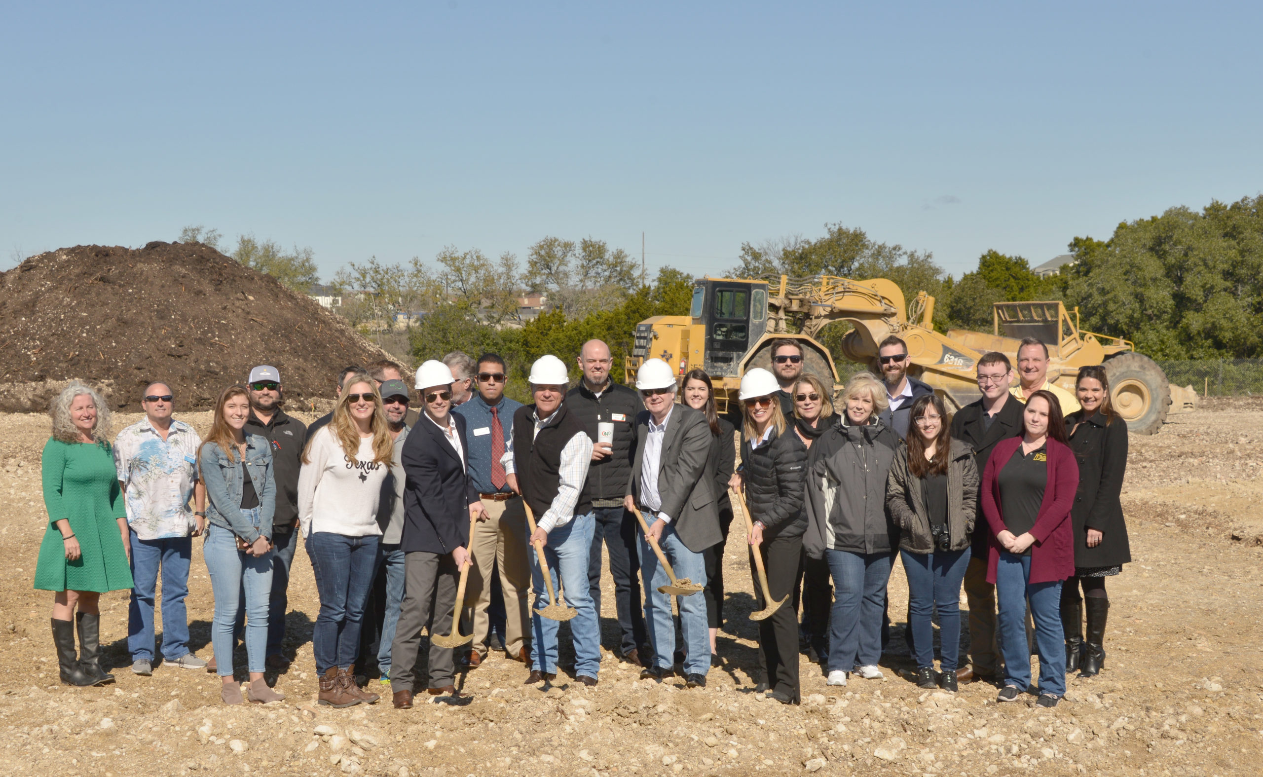 Construction crew during the groundbreaking of South Street Villas in Leander TX.